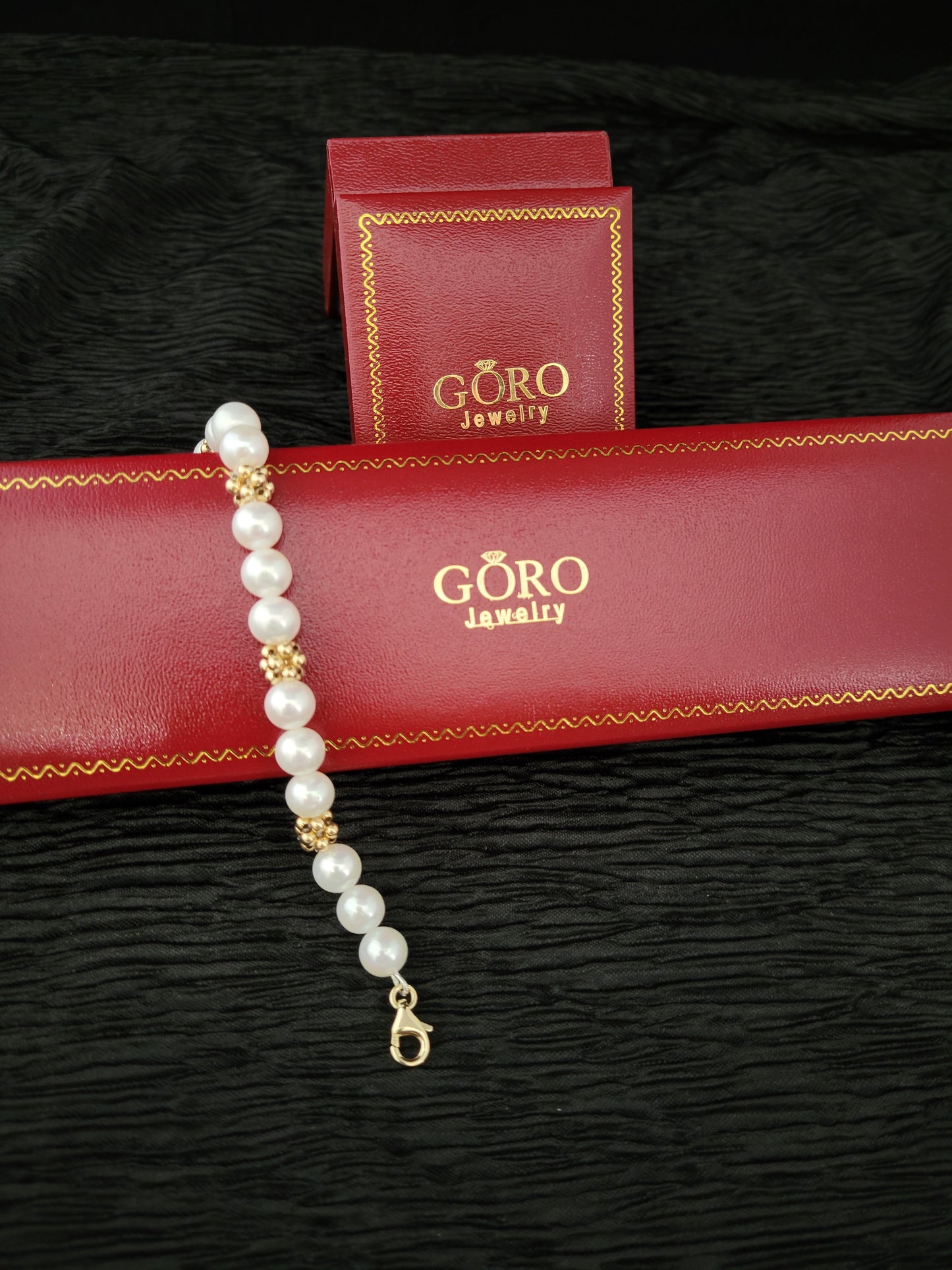 14k yellow gold and pearl Bracelct