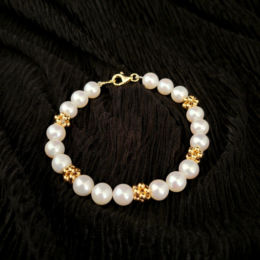 14k yellow gold and pearl Bracelct